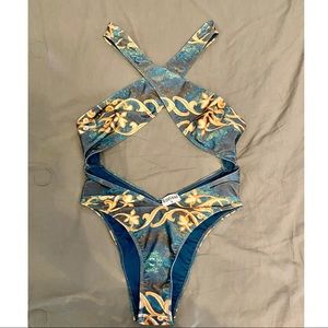 One piece swimsuit with matching mesh skirt